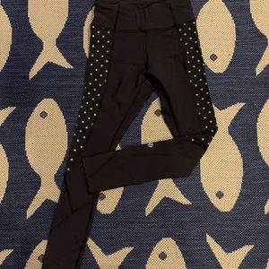 Black reflective scalloped Lululemon leggings